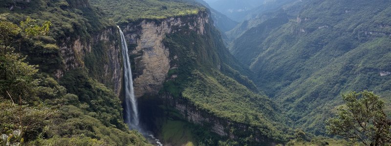 Towering Gocta Waterfall plunging into a lush cloud forest amphitheater near Chachapoyas