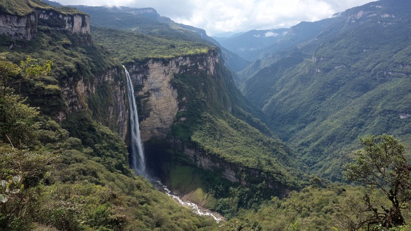 Towering Gocta Waterfall plunging into a lush cloud forest amphitheater near Chachapoyas