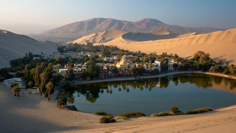 The oasis of Huacachina surrounded by sand dunes near Ica, Peru