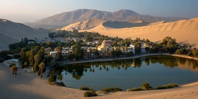 The oasis of Huacachina surrounded by sand dunes near Ica, Peru