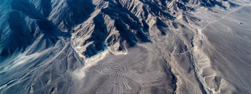 Aerial view of the hummingbird geoglyph among the Nazca Lines