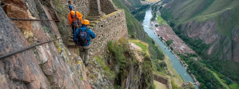 Adventure sports enthusiasts rappelling down ancient Inca walls, mountain biking through Sacred Valley trails, zip-lining over Urubamba River, rock climbing near Ollantaytambo, and white-water rafting with Machu Picchu mountain backdrop