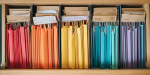 Email inbox with organized Machu Picchu ticket emails sorted into folders