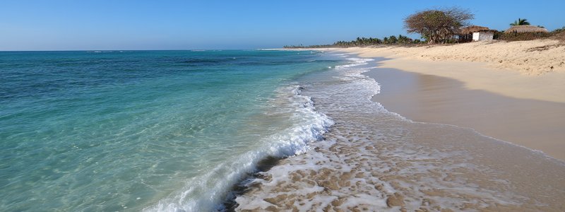 Golden beach of Punta Sal with clear blue waters