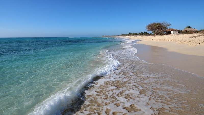Golden beach of Punta Sal with clear blue waters