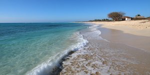Golden beach of Punta Sal with clear blue waters