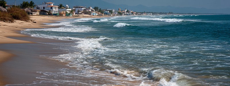 Serene beach view of Zorritos with golden sands and gentle waves
