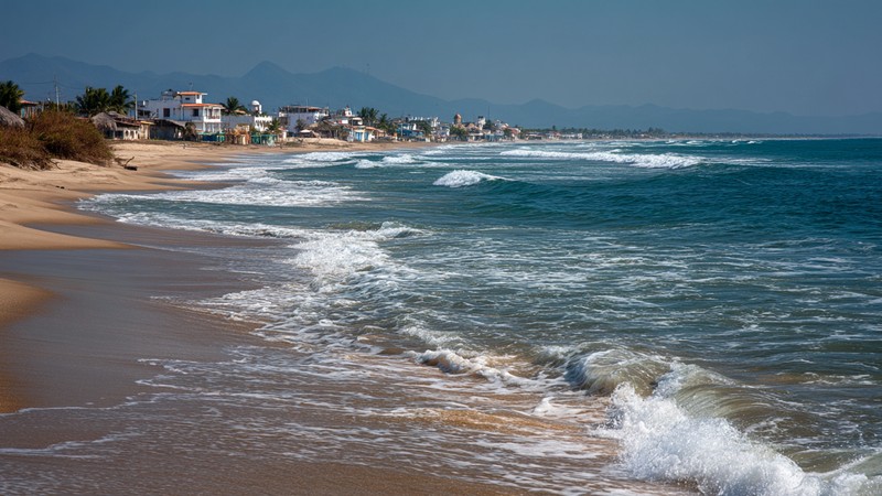 Serene beach view of Zorritos with golden sands and gentle waves