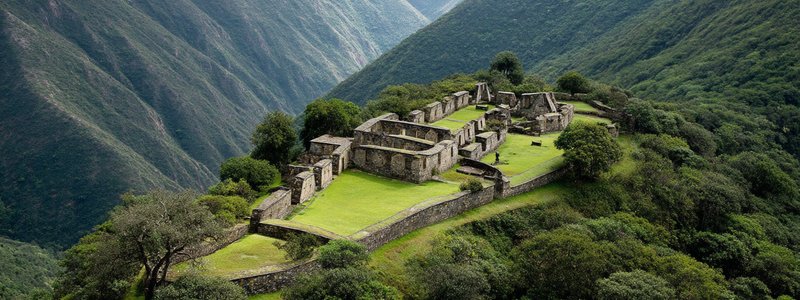 Terraced ruins of Choquequirao surrounded by green mountains